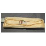 1950s Lotus Lady faux pearl necklace,