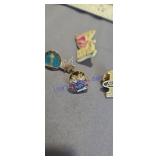 Gold tone pins