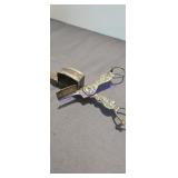 antique 19th-century candle snuffer and wick