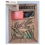 Assorted Ammo, Spent Casings, Lens Cover