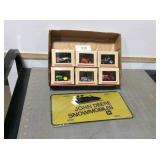 6 toy tractors, 1/64 scale & JD Snowmobiles sign