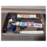 Assorted toy tractor trailers