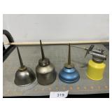 4 miniature oil cans