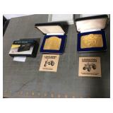 2 John Deere belt buckles & 10' tape measure