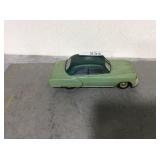 Vintage green car coin bank