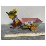 Vintage tin rabbit pulling a cart