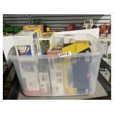 Tote of empty farm toy boxes