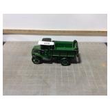 Cast iron green dump truck w/metal dump spring