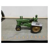 Vintage John Deere tractor w/man & rubber wheels,