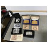 Cadillac medallion, JD belt buckles & calendar