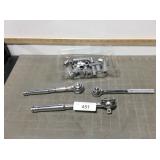 1/2' ratchet & two 3/8' ratchets & misc sockets