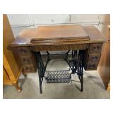 VIntage Singer treadle sewing machine in cabinet