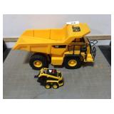 CAT dump truck & CAT skid steer