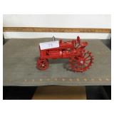 Red NF tractor with metal spoke wheels