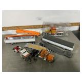 Semi tractors and grain trailers