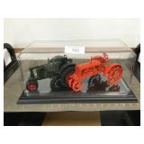 A-C WC & M-H Challenger tractors in display case