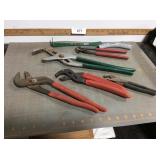 Channel lock pliers, pry bar, bolt cutters