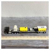 Semi truck w/liquid fertilizer tender trailer