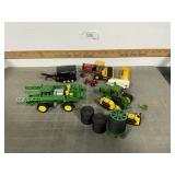 Assorted 1/64 scale farm toys