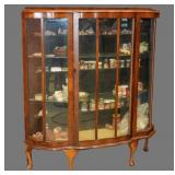 Demilune curio cabinet