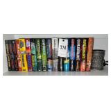Clive Cussler books and candle warmer