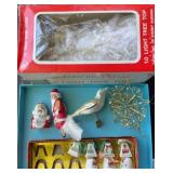 Vintage Christmas ornaments and Santa light bulb