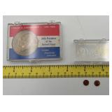 1971 Eisenhower dollar and two miniature pennies