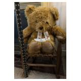 Wooden childï¿½s rocker and teddy bear