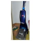 Bristle vacuum and box of supplies