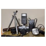 Vintage Minolta camera flash lens tripod