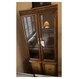 Curio cabinet, glass shelves, and built-in light