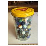 Superman jar with marbles