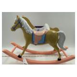 Toy baby doll rocking horse