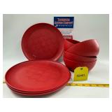 Red plastic bowls and plates