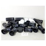 White PVC and Black ABS Plastic 4' Pipe Fittings