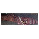 Hand-knotted Persian wool rug.