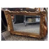Vintage ornate gold-gilded plastic frame wall mirr