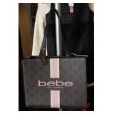 Bebe Ember Tote in black with pink accents