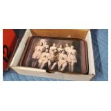 Vintage copper frame clock featuring a team photo