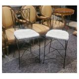 Pair of vintage wrought iron bar stools with white
