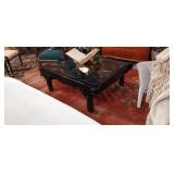 Black-stained wood and tempered glass coffee table