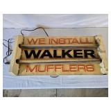 Walker Mufflers sign