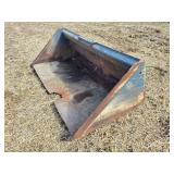 Skid loader bucket
