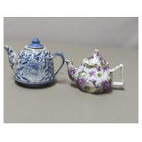 Two Porcelain Miniature Tea Pots