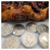 Seven 1974 Eisenhower Dollars