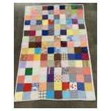 PATCHWORK HAND TIED QUILT 54 NI. X 82 IN.