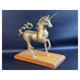 Brass Unicorn Mounted on Wood Repaired ?