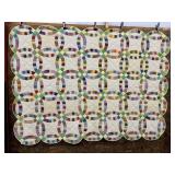 Signed Double Wedding Ring Hand Stitched Quilt.