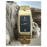 Vintage Seiko Quartz Gold Tone Black Face Watch