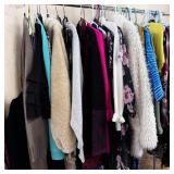 Rack of Ladies Clothes Sizes Vary